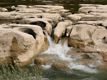 Rock formation in the river Ain, Pont-de-Poitte, France